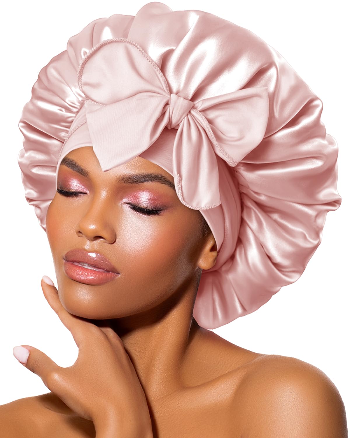 BONNET QUEEN front view of cream-pink bonnet showing shape and coverage