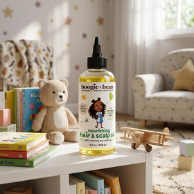 boogie and bean close-up oil drops on fingers showing smooth texture for easy application