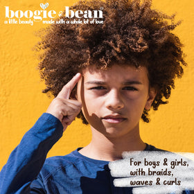 Boogie and Bean bottle next to hand showing product size and travel-friendly benefit