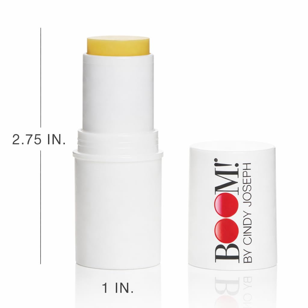 BOOM! by Cindy Joseph next to coin pocket-scale proving travel-ready size