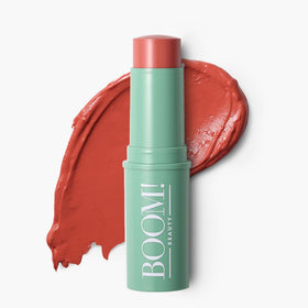 BOOM! by Cindy Joseph front-closed stick showing compact design and portability benefit
