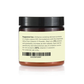 Bos Essentials label close-up displaying cosmetic-grade and non-GMO information