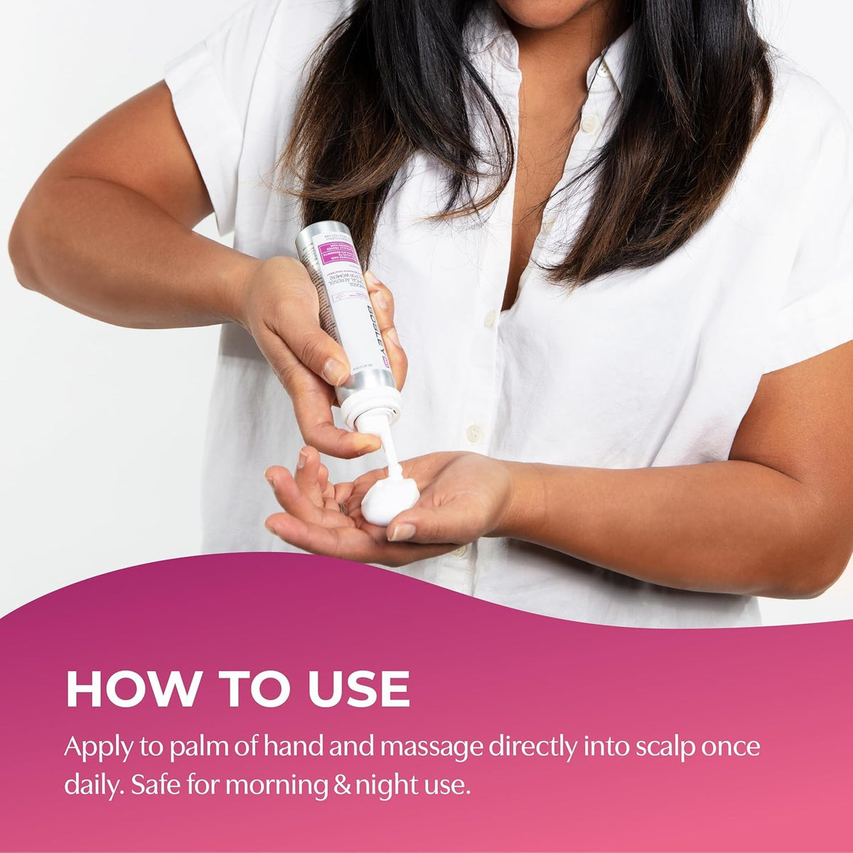 BosleyMD foam applied to scalp with fingers, showing precise no-drip application benefit
