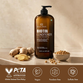 Botanic Hearth 16 fl oz bottle in hand to show true size and scale
