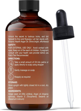 Botanic Hearth bottle next to hand showing 4 fl oz scale and portability