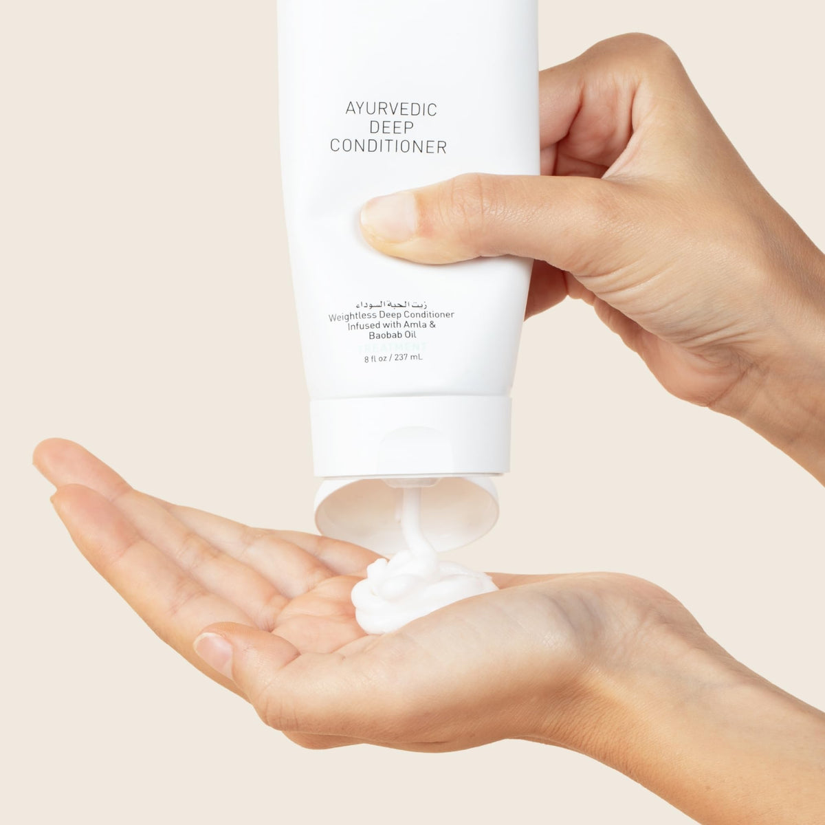 Label and ingredient panel of Bounce Curl displaying vegan, silicone-free formulation benefits