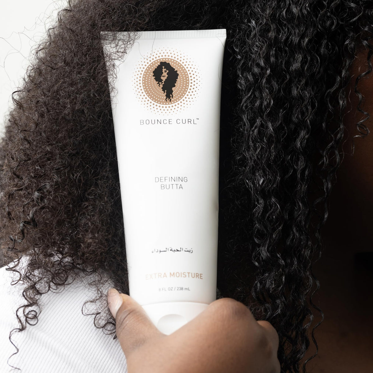 Bounce Curl label close-up highlighting natural ingredients and benefits