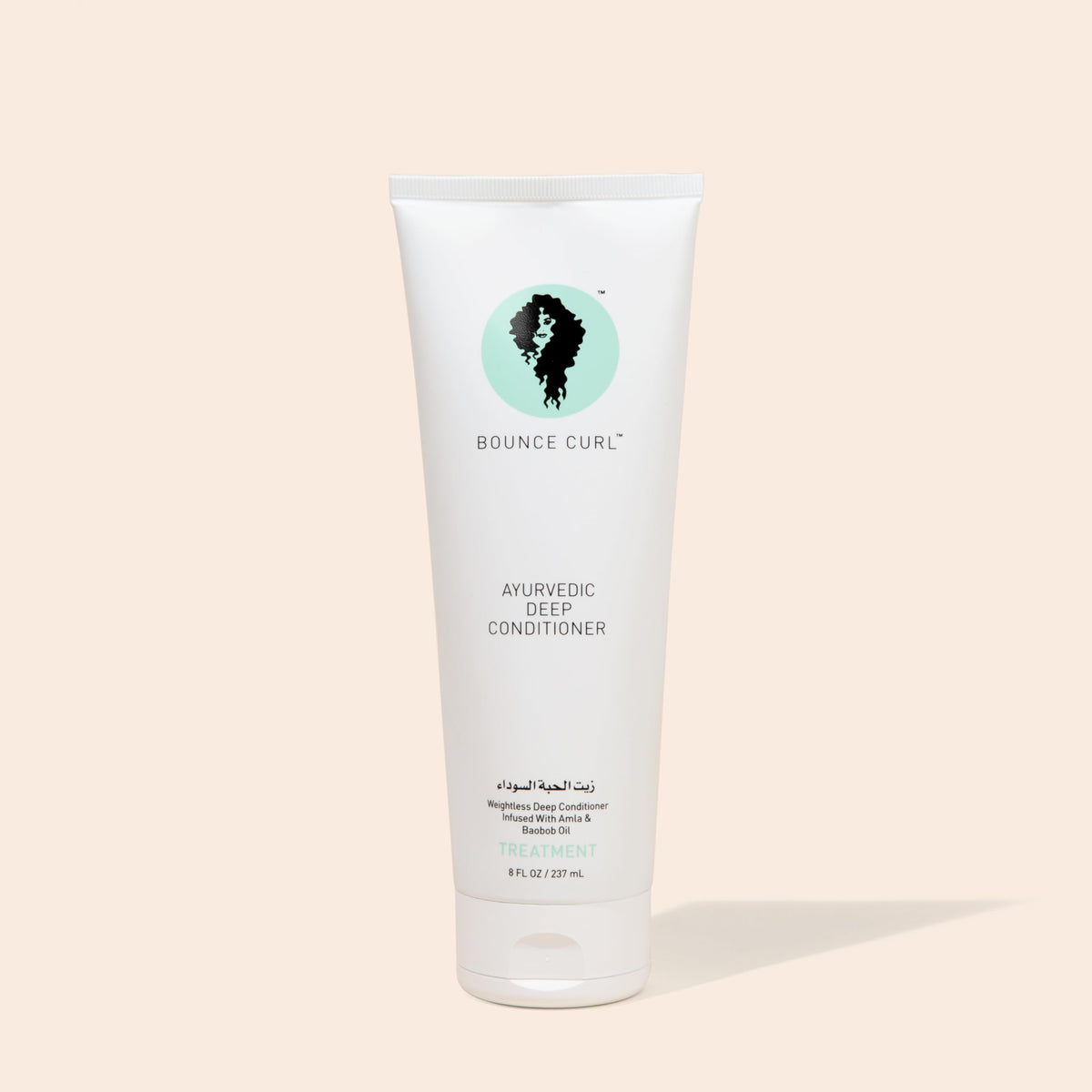 Jar opened to reveal creamy consistency of Bounce Curl for intense moisture benefits