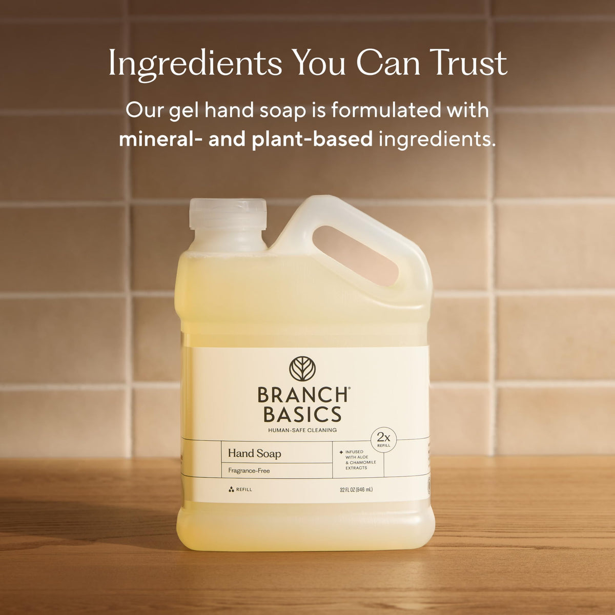 Branch Basics pouring refill into glass bottle for a waste-reducing benefit