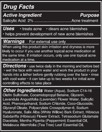 Brickell men's acne face wash on bathroom shelf in lifestyle setting