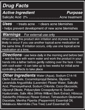 Brickell men's acne face wash on bathroom shelf in lifestyle setting