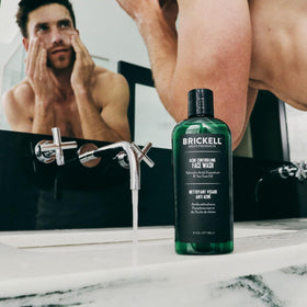 Brickell men's acne face wash ingredients display featuring salicylic acid benefits