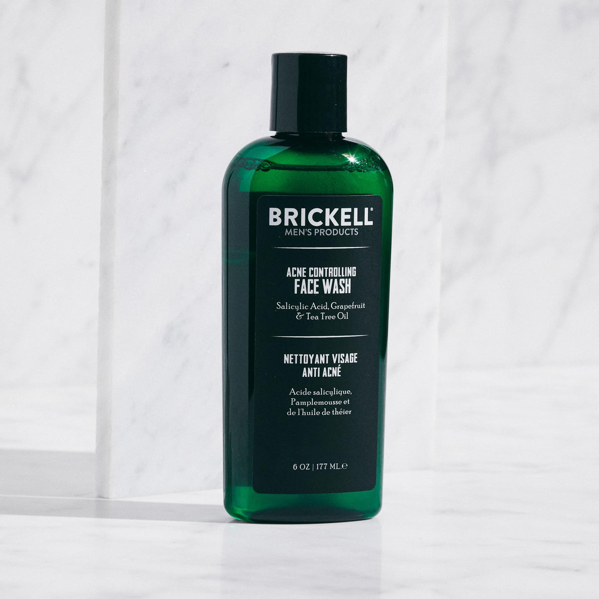 Brickell men's acne face wash rich foam texture highlighting gentle cleanse