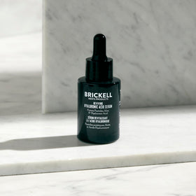 Brickell serum being applied to hands demonstrating easy use and fast feel
