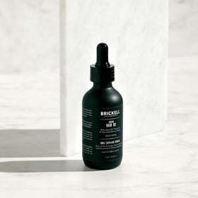 Brickell Men's Argan Oil key ingredients display of argan oil keratin and vitamin E
