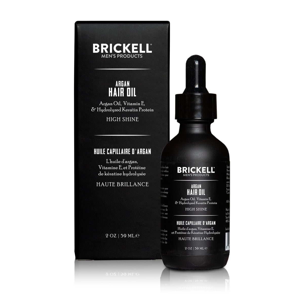 Brickell Men's Argan Oil dropper dispensing precise amount for controlled use