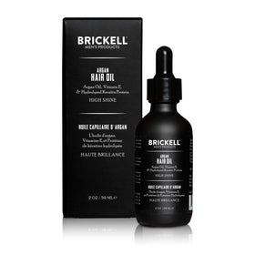Brickell Men's Argan Oil dropper dispensing precise amount for controlled use
