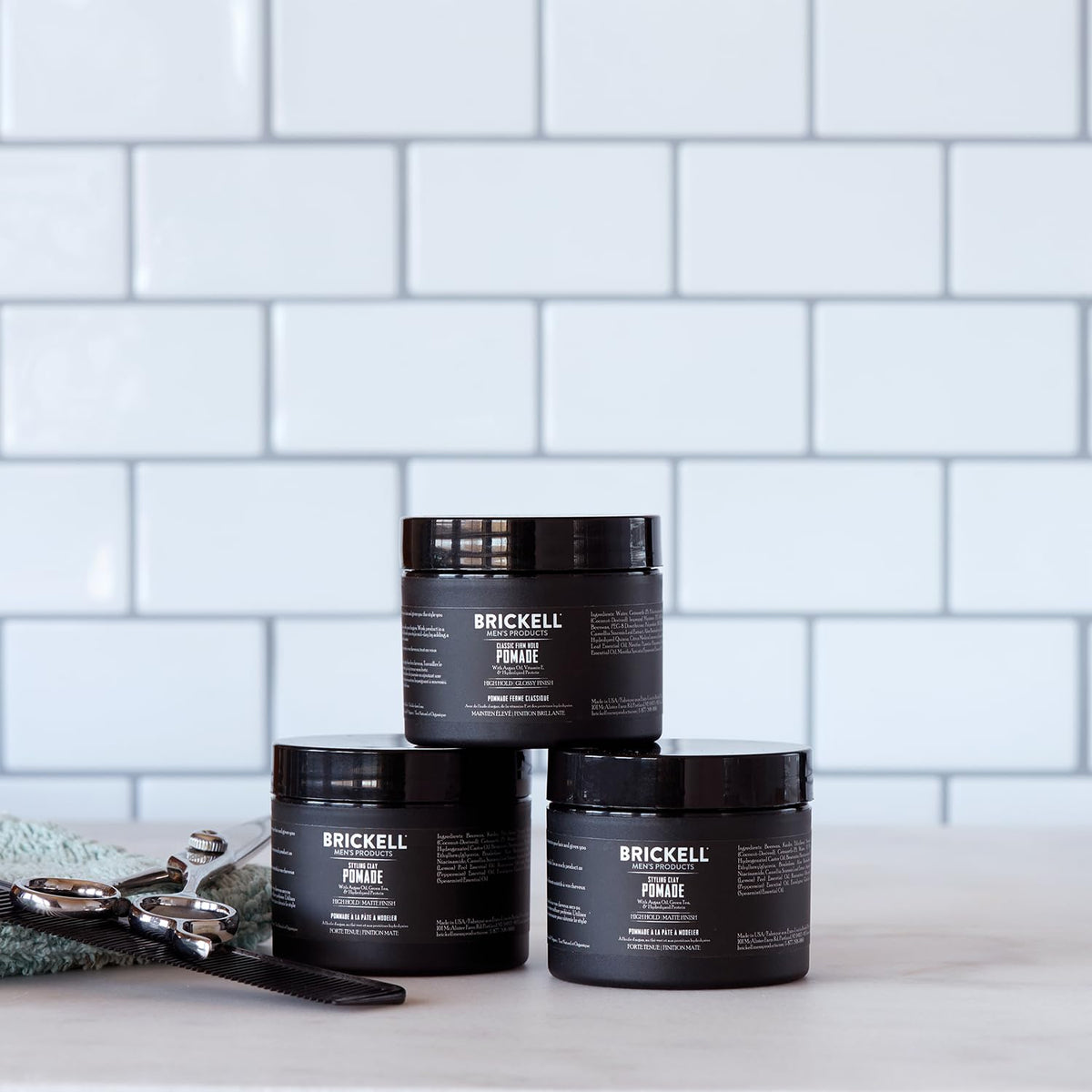 Brickell Men's Products argan oil and botanical visuals highlighting conditioning benefit