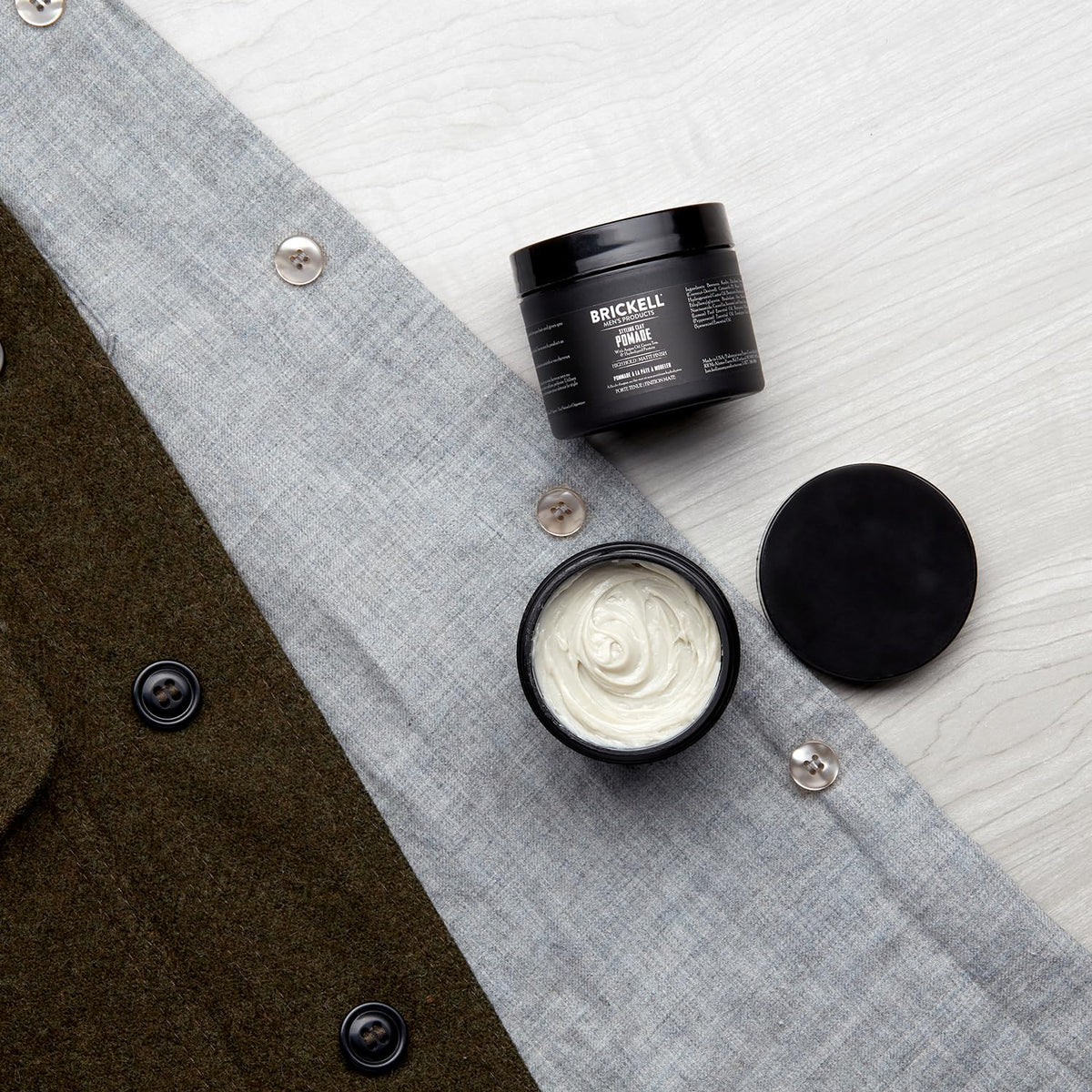 Brickell Men's Products close-up of clay texture showing grip and matte, illustrates styling control