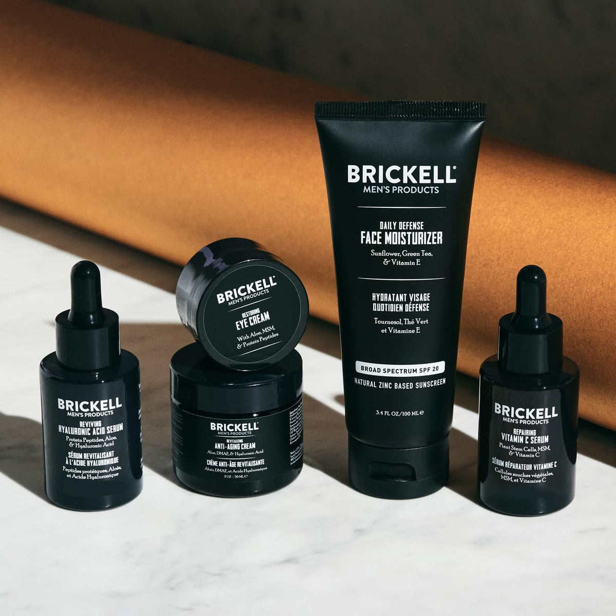 Brickell Men's Products day moisturizer with SPF label visible highlighting daily sun protection benefit