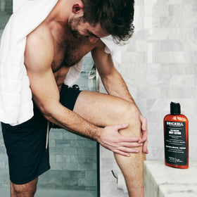 Brickell Men's Products next to common objects showing 8 ounce size and travel-ready benefit
