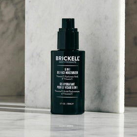 Brickell Men’s 1.7 oz tube next to common items to show true size