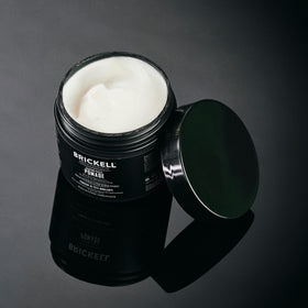 Brickell pomade on bathroom shelf during morning routine showing fresh peppermint scent benefit