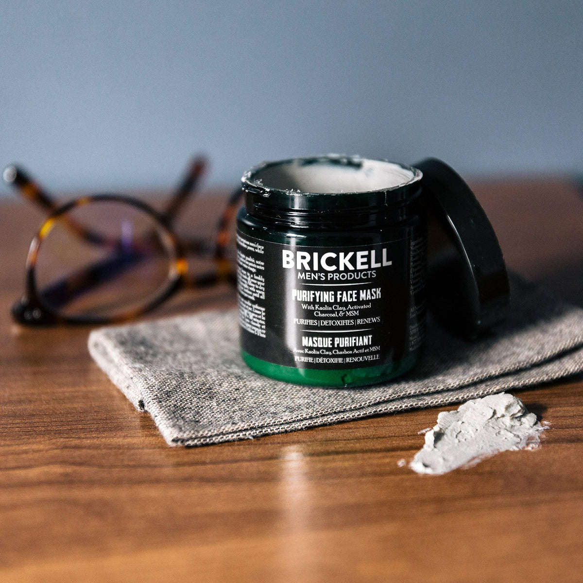 Close-up of activated charcoal swirl in mask, Brickell clarifying action benefit