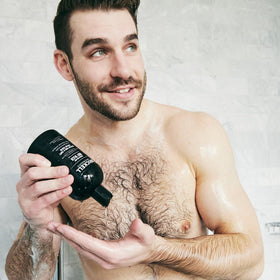 Brickell Men’s foam texture on hand showing rich lather and gentle cleansing
