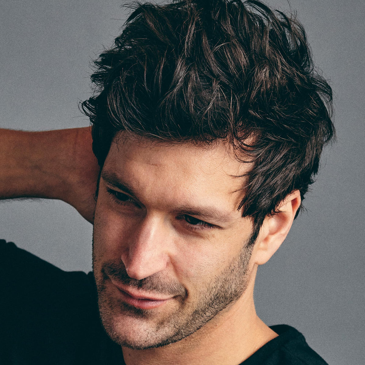Before and after Brickell Men's hair powder showing increased volume and texture