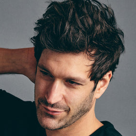 Before and after Brickell Men's hair powder showing increased volume and texture