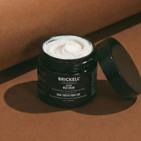 Brickell Men's Products applied to a man's jawline showing smooth absorption and firmer-looking neck