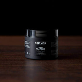 Brickell Men's pomade with beeswax and shea butter visual showing conditioning benefits