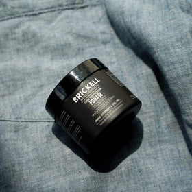 Brickell Men's Products open pomade showing fibrous texture for easy shaping