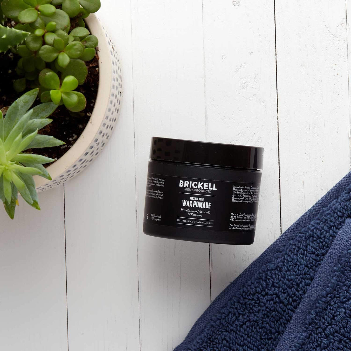 Brickell Men's pomade styled hair result showing natural shine and flexible hold