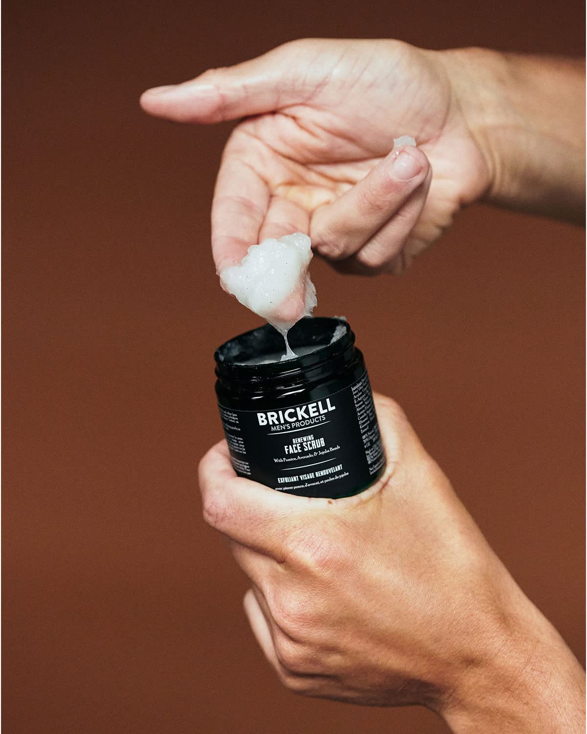 Brickell pre-shave application next to razor showing reduced tugging benefit