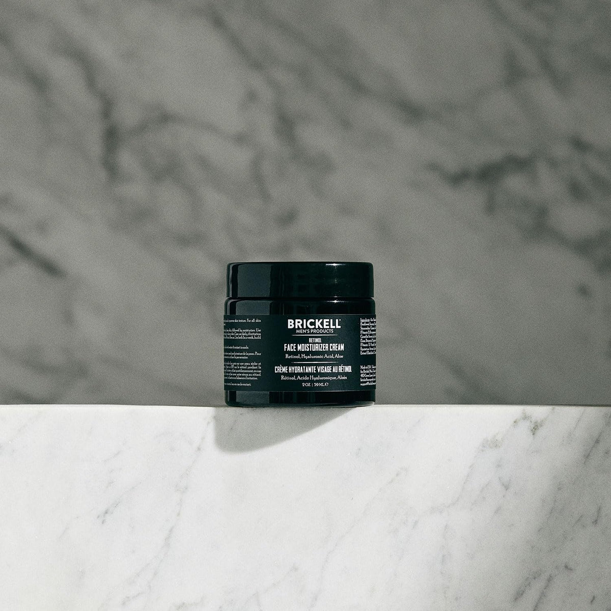 Brickell Men’s moisturizer open cap revealing cream consistency for easy use