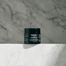Brickell Men’s moisturizer open cap revealing cream consistency for easy use