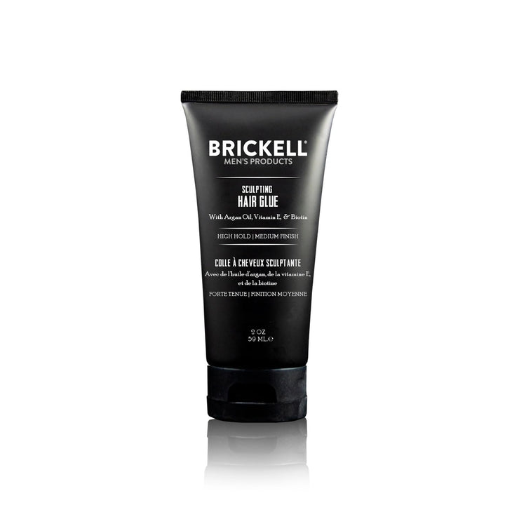 Brickell sculpting hair glue front packaging shows compact travel-ready tube and branding benefit