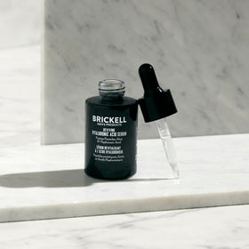 Brickell dropper dispensing clear serum texture for fast absorption