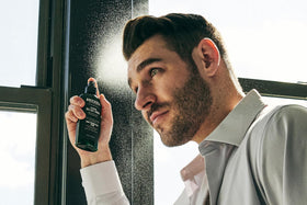 Brickell Men’s spray applied to hair creating textured beach-style hold
