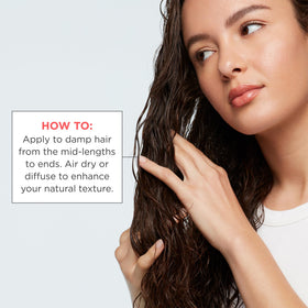 Briogeo application on damp hair demonstrating scrunch for definition