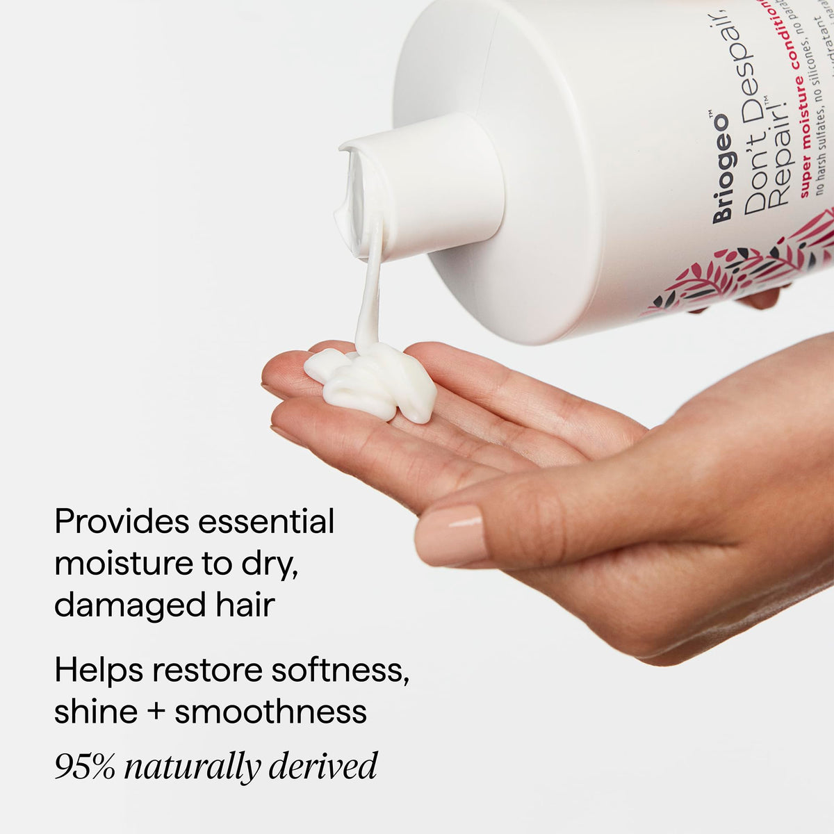 Briogeo conditioner in hand showing the 2 oz size for scale and portability