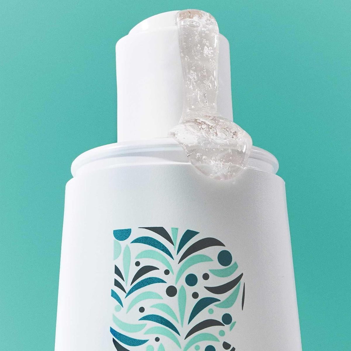 Close-up of caffeine biotin peptides ingredients with Briogeo benefit for stronger strands