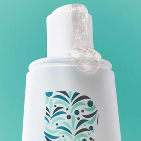 Close-up of caffeine biotin peptides ingredients with Briogeo benefit for stronger strands