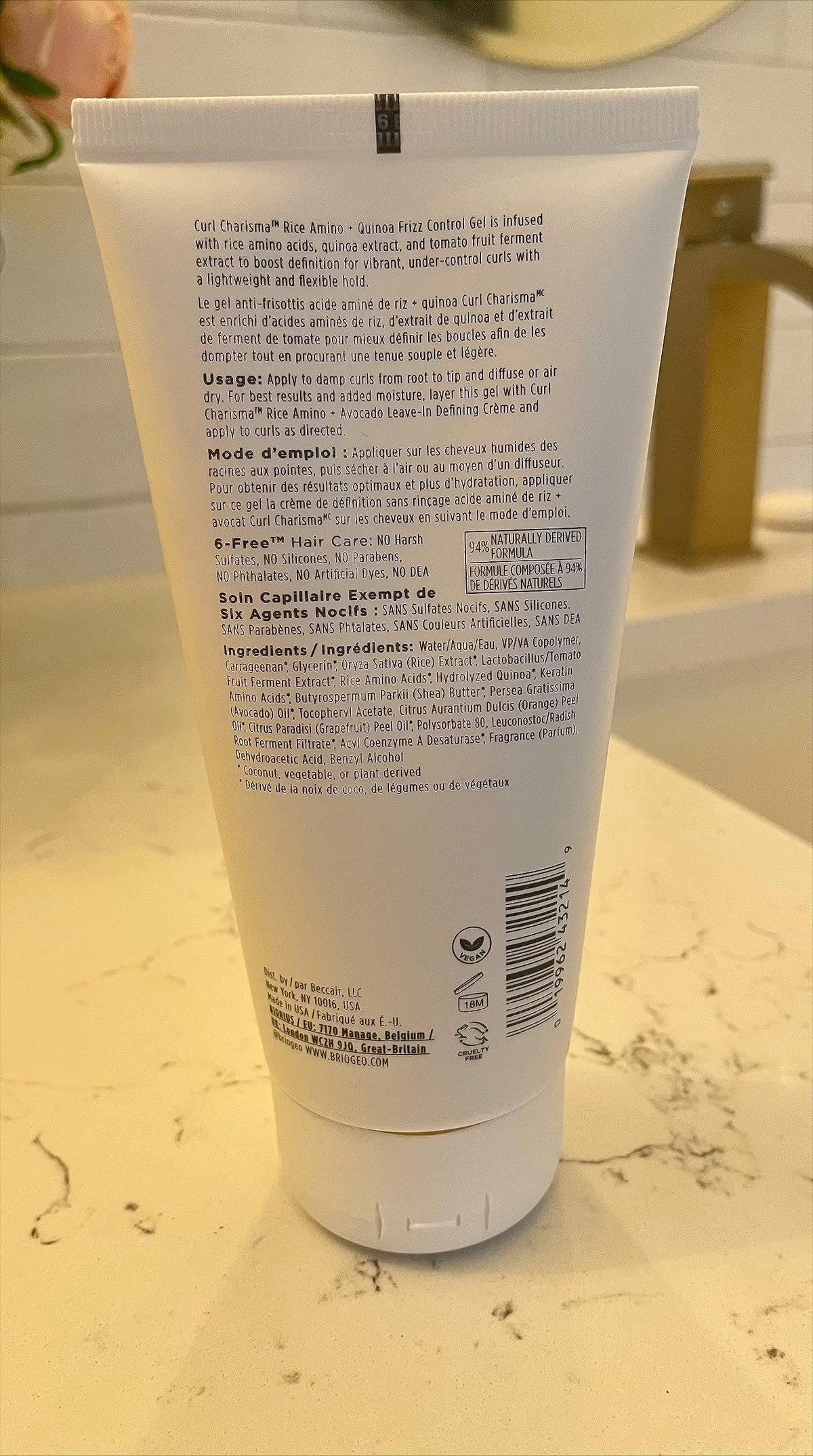 Briogeo on bathroom shelf in lifestyle shot suggesting everyday styling use