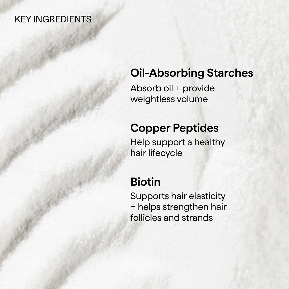 Briogeo model refreshing hair outdoors for instant volume