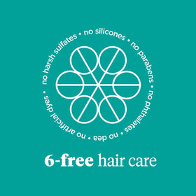 Open Briogeo bottle pouring foamy shampoo emphasizing gentle cleanse and energizing feel