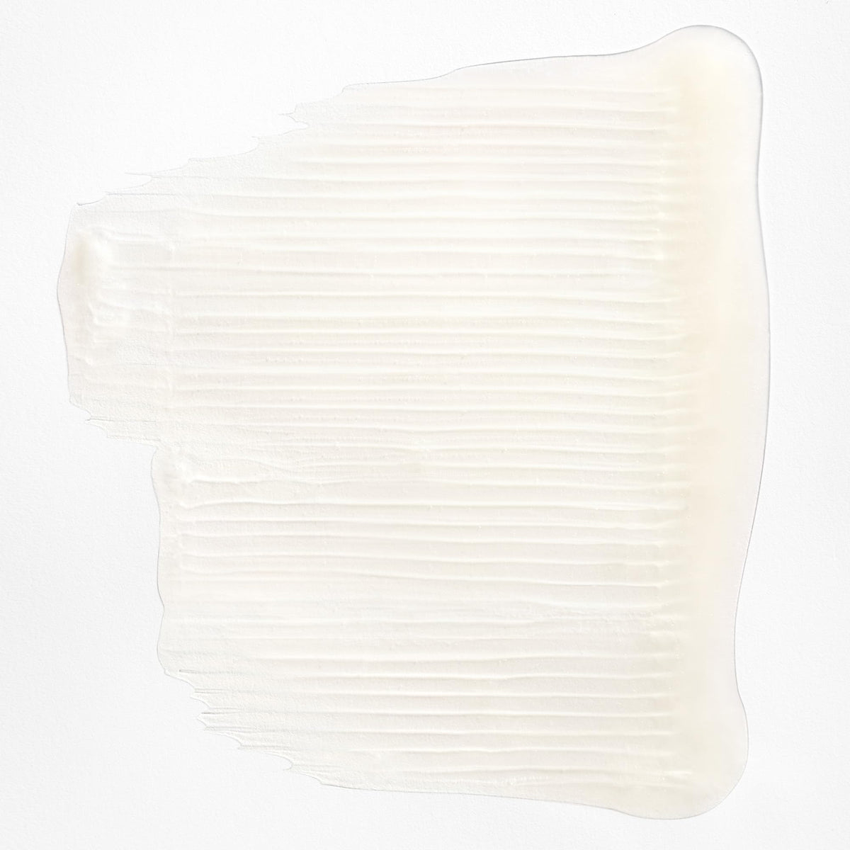 Briogeo shampoo texture on hand demonstrating creamy, hydrating lather benefit