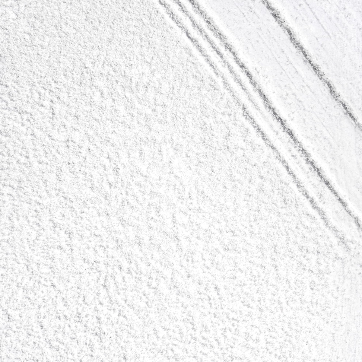 briogeo powder texture close-up showing fine starch and charcoal particles for oil absorption